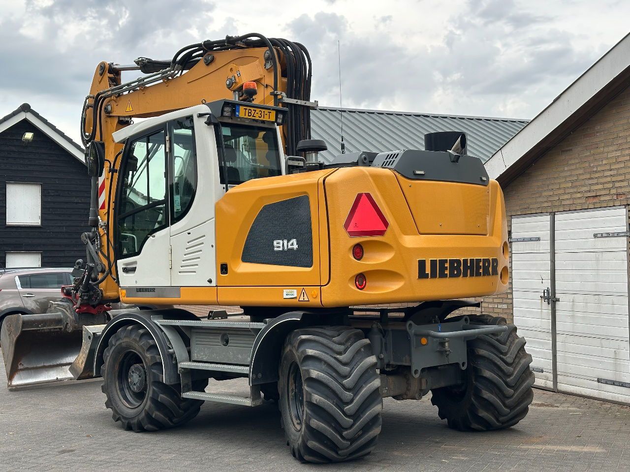 2018 Liebherr A914 wheel excavator, rear three-quarter view 2018 Liebherr A914 wheel excavator, rear three-quarter view