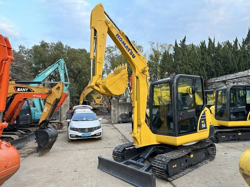 2023 Komatsu PC56-7 mini excavator, front three-quarter view 2023 Komatsu PC56-7 mini excavator, front three-quarter view