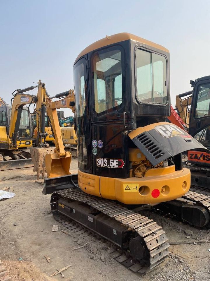 2025 Caterpillar 303.5E mini excavator rear three-quarter view 2025 Caterpillar 303.5E mini excavator rear three-quarter view