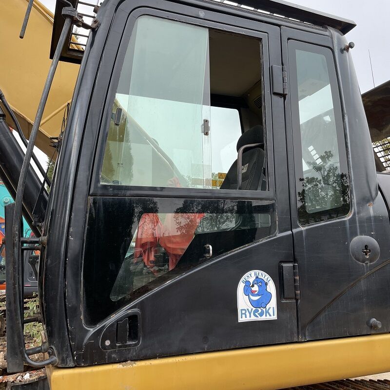 Caterpillar 329D crawler excavator cab side view Caterpillar 329D crawler excavator cab side view