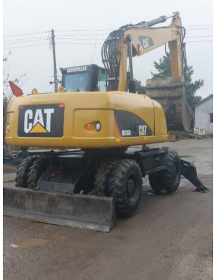 2007 Caterpillar M316D wheel excavator rear view 2007 Caterpillar M316D wheel excavator rear view