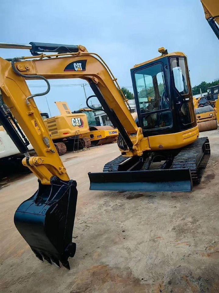 2024 Caterpillar 304 mini excavator, front three-quarter view 2024 Caterpillar 304 mini excavator, front three-quarter view