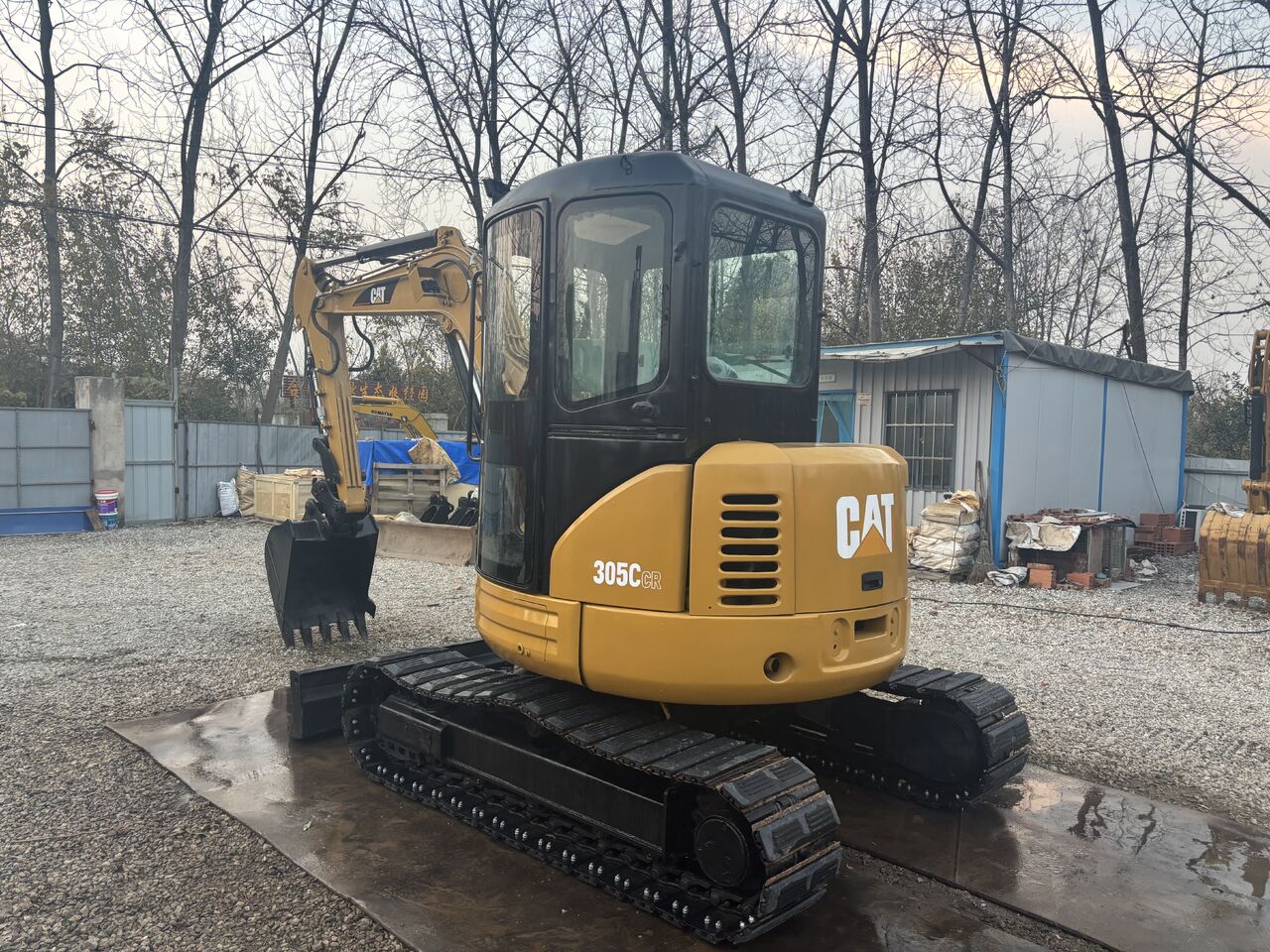 2023 Caterpillar 305C CR mini excavator, rear three-quarter view 2023 Caterpillar 305C CR mini excavator, rear three-quarter view