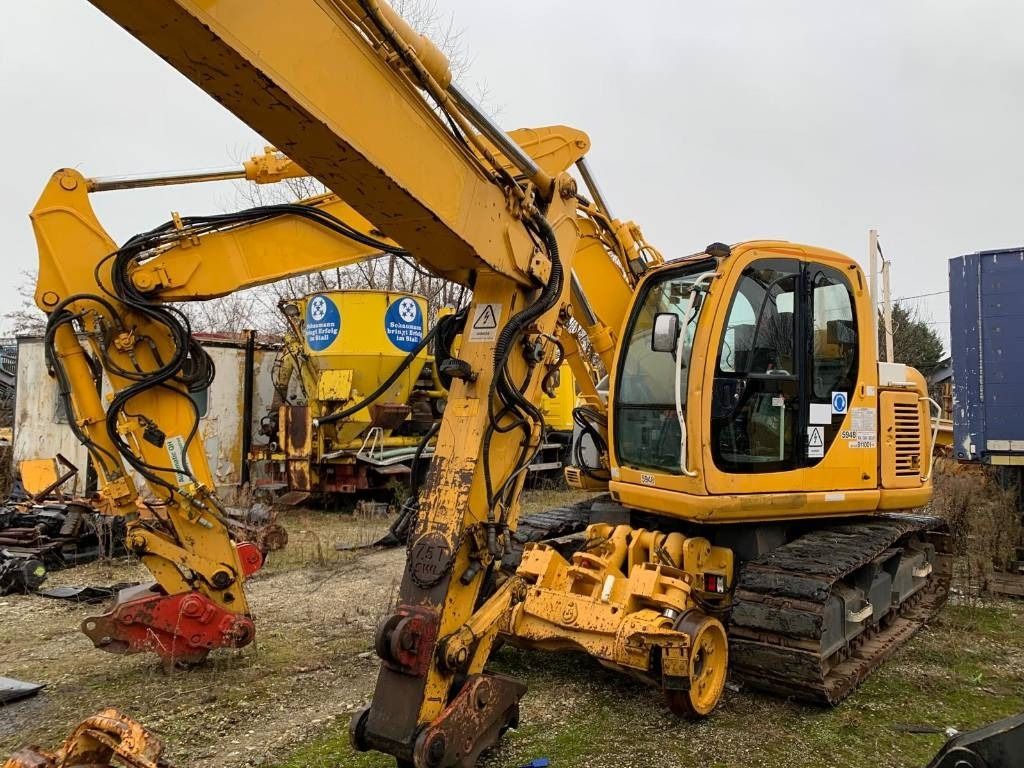 2006 New Holland E135SR-1ES crawler excavator, side view 2006 New Holland E135SR-1ES crawler excavator, side view