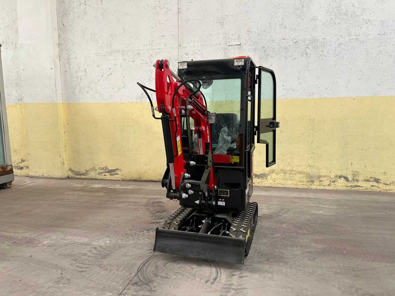 Vicsec VC13CD mini excavator, front three-quarter view