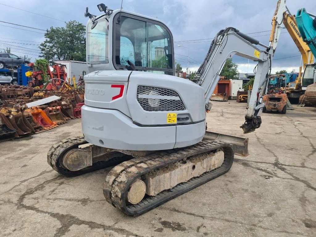 2016 Volvo ECR58D mini excavator, rear three-quarter view 2016 Volvo ECR58D mini excavator, rear three-quarter view