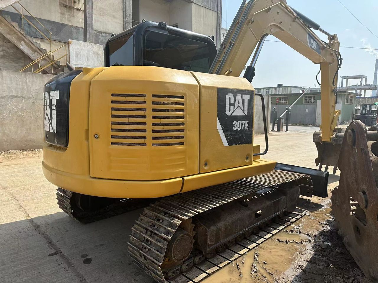 2022 Caterpillar 307E crawler excavator, rear three-quarter view 2022 Caterpillar 307E crawler excavator, rear three-quarter view