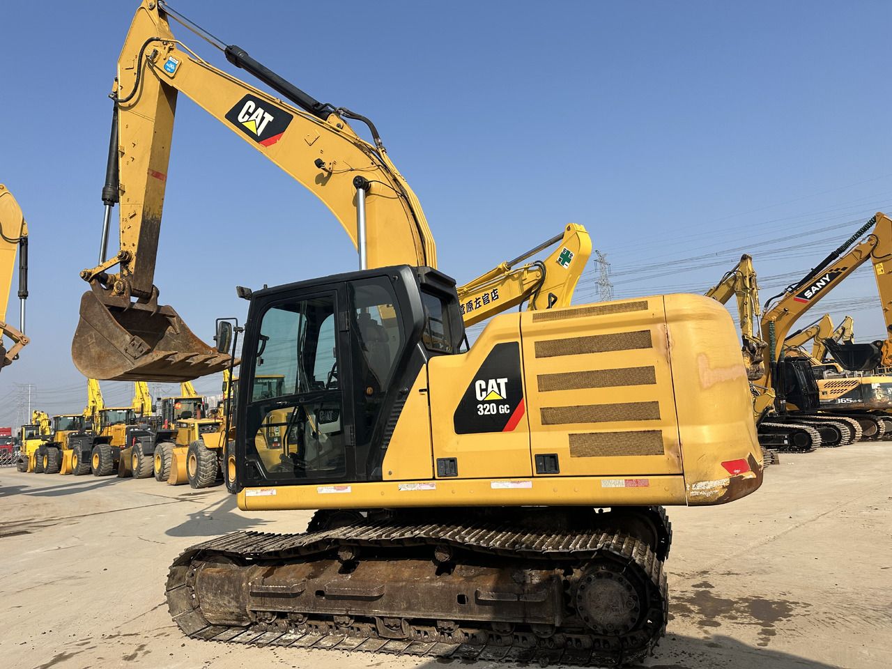 Caterpillar 320GC crawler excavator, side view