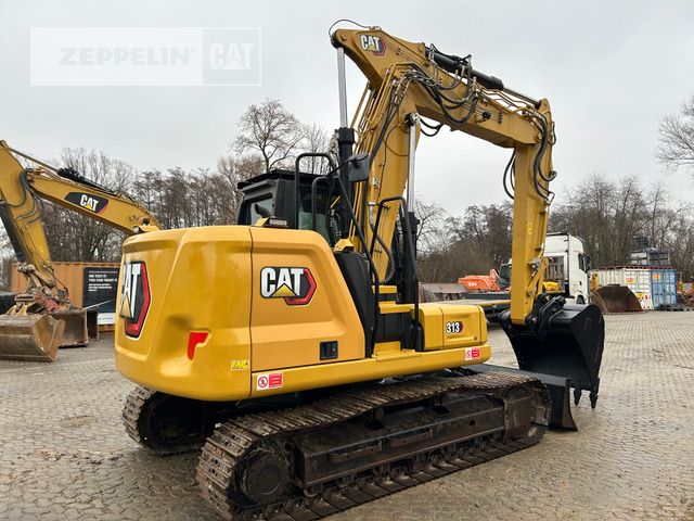 2022 Caterpillar 313-07B crawler excavator, rear three-quarter view