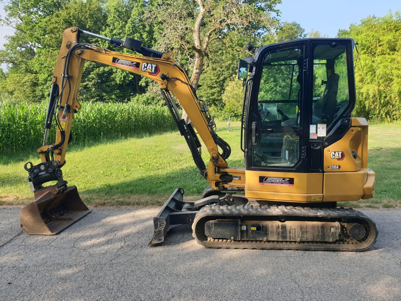 2022 Caterpillar 304-07 mini excavator, side view