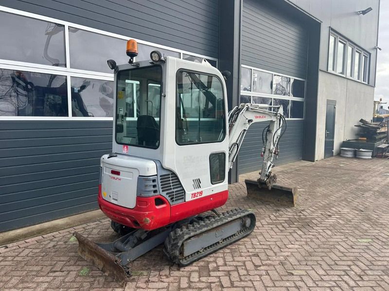 2011 Takeuchi TB219 mini excavator, rear three-quarter view 2011 Takeuchi TB219 mini excavator, rear three-quarter view