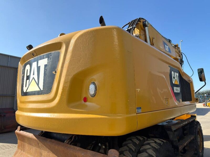 2014 Caterpillar M320F wheel excavator rear view 2014 Caterpillar M320F wheel excavator rear view