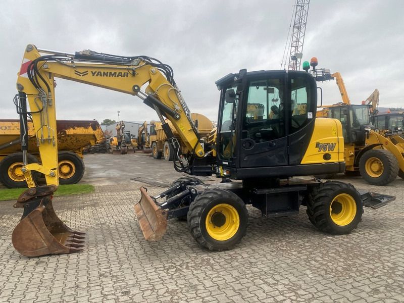 2021 Yanmar B95W wheel excavator, side profile view 2021 Yanmar B95W wheel excavator, side profile view