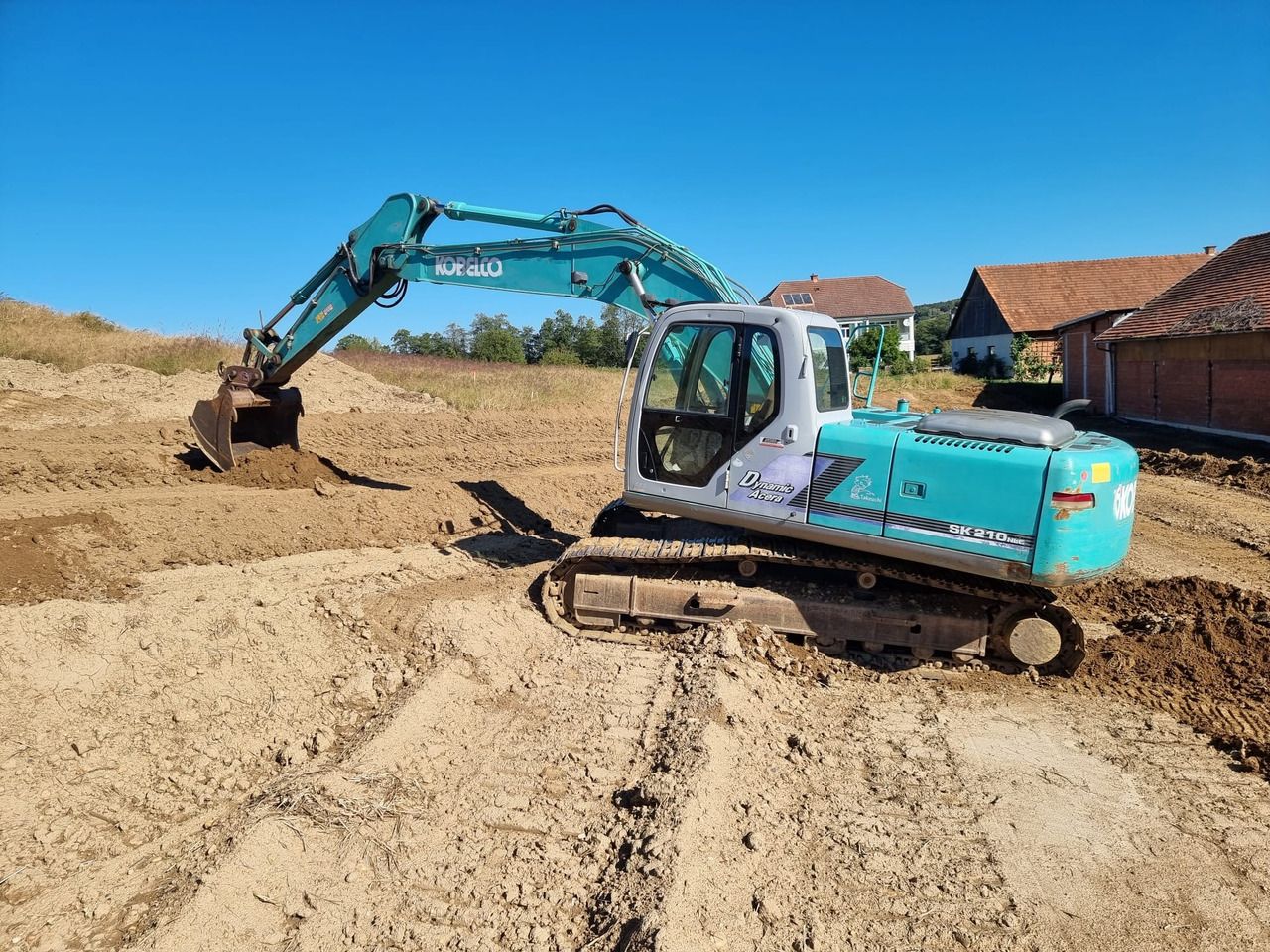 2004 Kobelco SK210NLC-6E crawler excavator side view