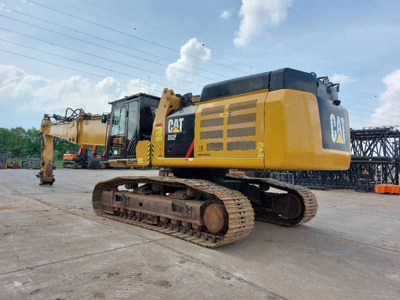 2016 Caterpillar 352F crawler excavator, rear three-quarter view