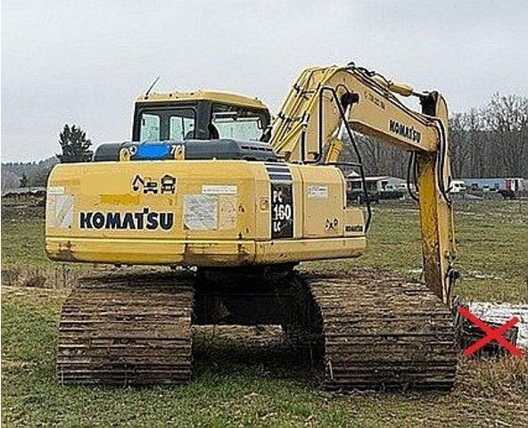 2004 Komatsu PC160LC-7K crawler excavator, rear three-quarter view 2004 Komatsu PC160LC-7K crawler excavator, rear three-quarter view