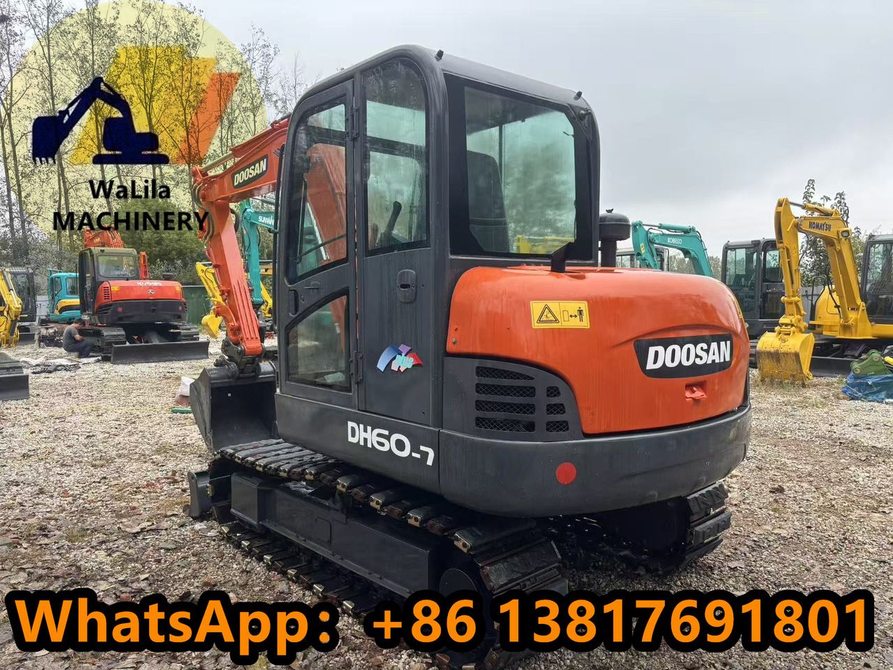2023 Doosan DH60-7 mini excavator, rear three-quarter view