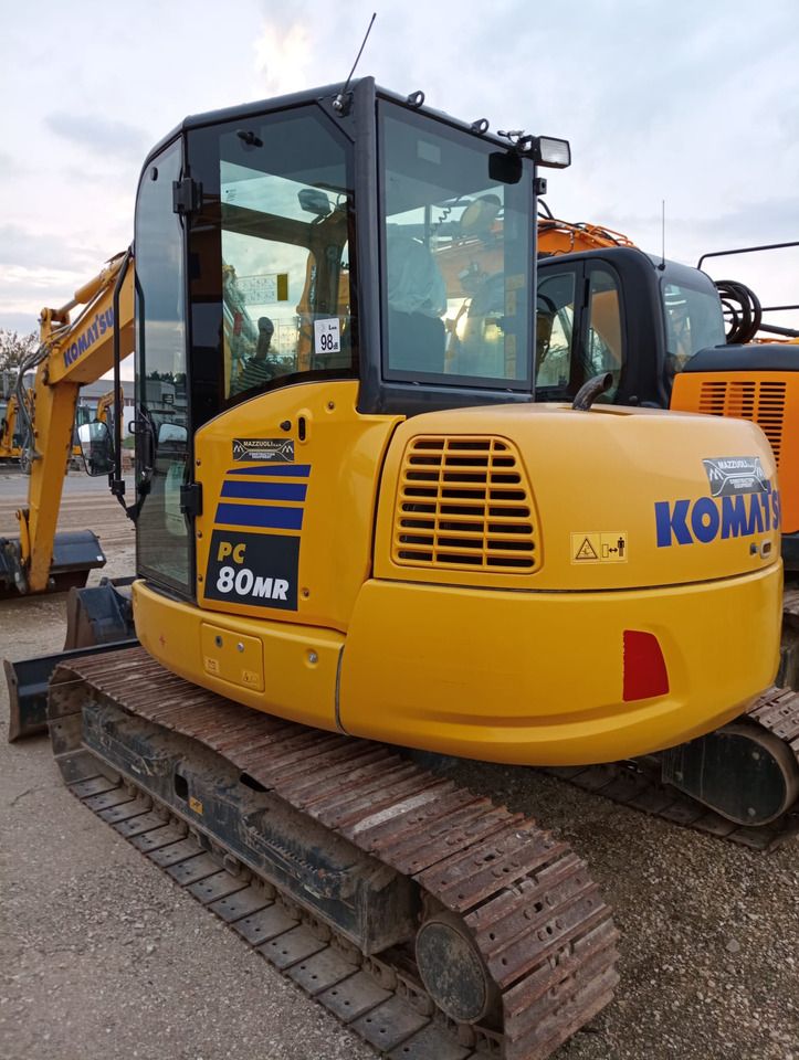 2023 Komatsu PC80MR-5 crawler excavator, rear three-quarter view 2023 Komatsu PC80MR-5 crawler excavator, rear three-quarter view
