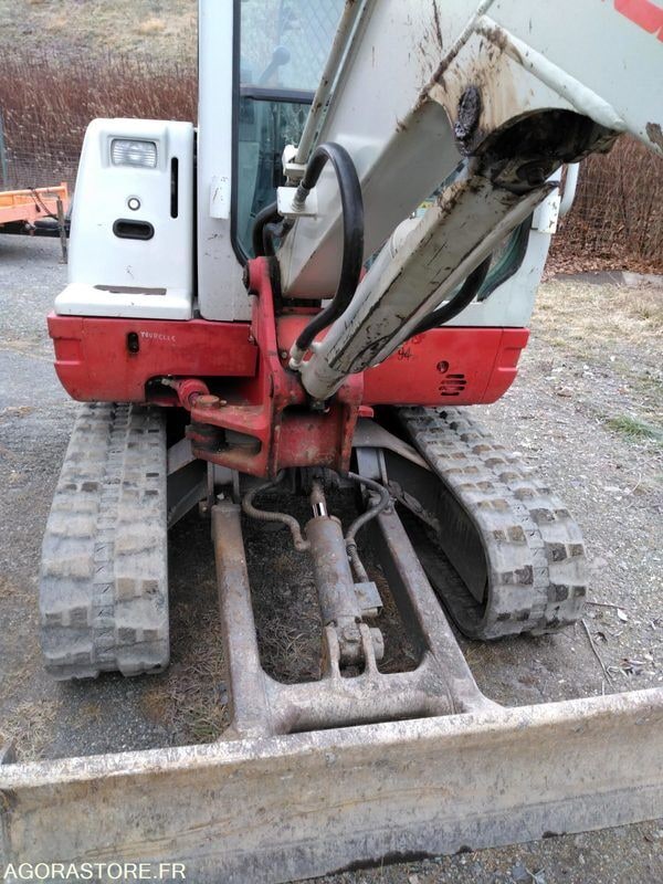 2012 Takeuchi TB 228 mini excavator front view 2012 Takeuchi TB 228 mini excavator front view