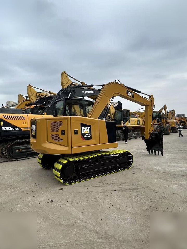 2019 Caterpillar 307.5 crawler excavator, rear three-quarter view 2019 Caterpillar 307.5 crawler excavator, rear three-quarter view