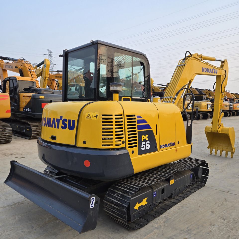 2024 Komatsu PC56 mini excavator, rear three-quarter view 2024 Komatsu PC56 mini excavator, rear three-quarter view