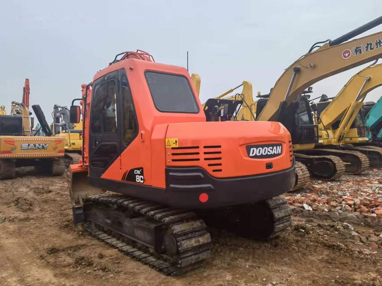 2021 Doosan DX80C crawler excavator, rear three-quarter view 2021 Doosan DX80C crawler excavator, rear three-quarter view