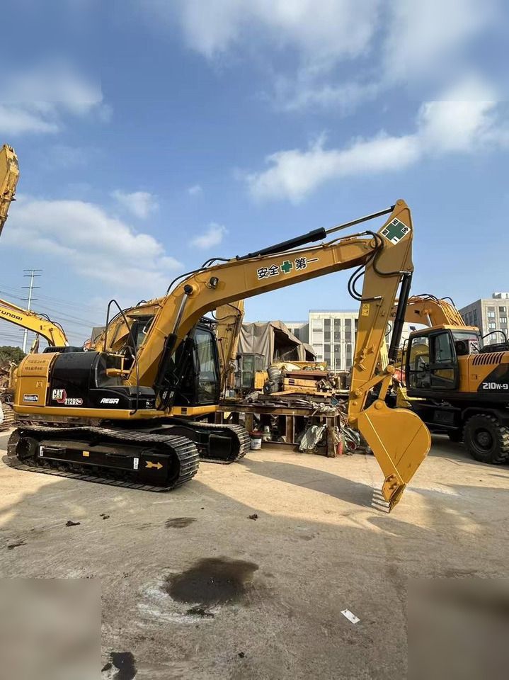 2022 Caterpillar 312D2 GC crawler excavator, side view