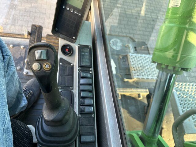 2012 Sennebogen 818 wheel excavator cab interior view 2012 Sennebogen 818 wheel excavator cab interior view