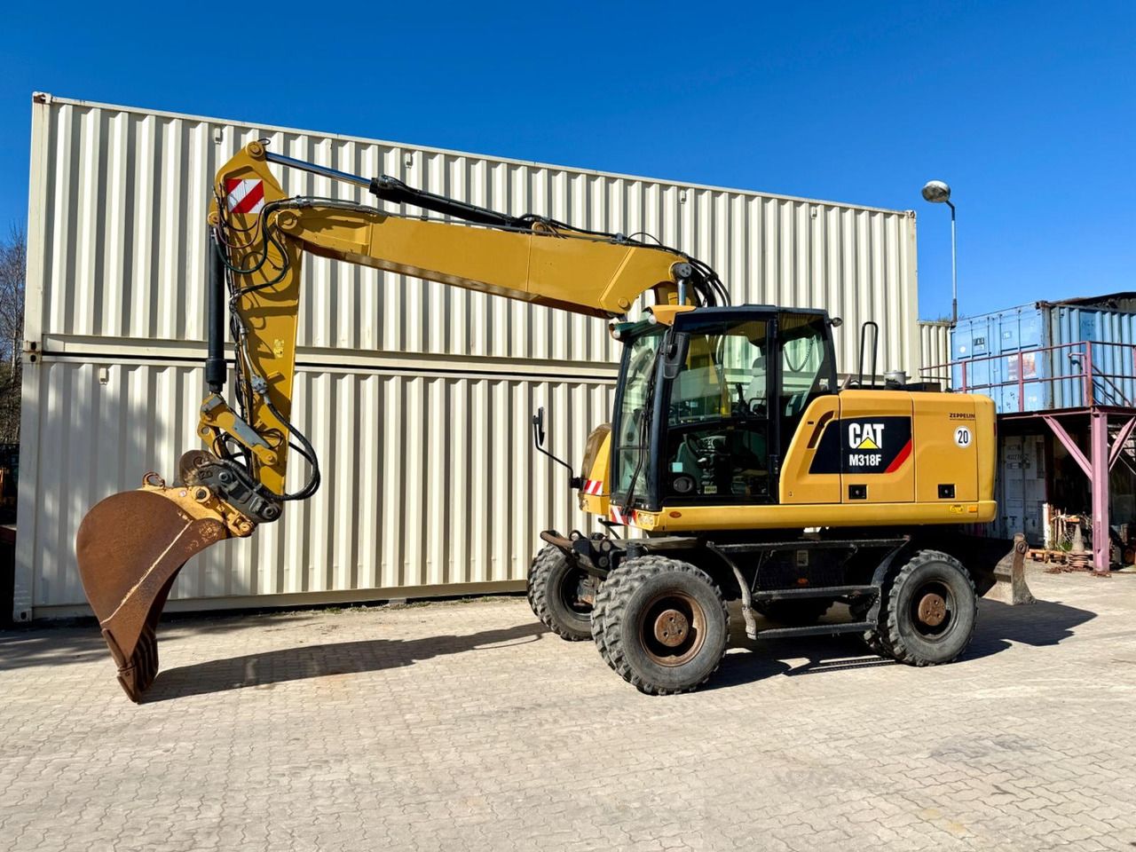 2016 Caterpillar M318F wheel excavator, side view 2016 Caterpillar M318F wheel excavator, side view