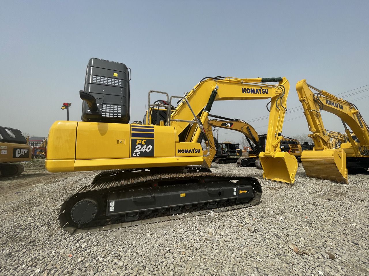 2023 Komatsu PC240LC crawler excavator, side profile view