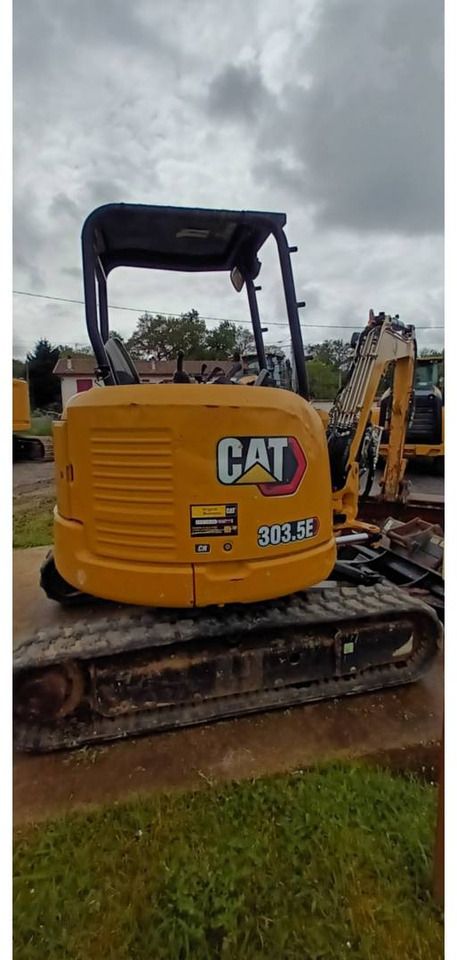2020 Caterpillar 303.5E CR crawler excavator, rear three-quarter view