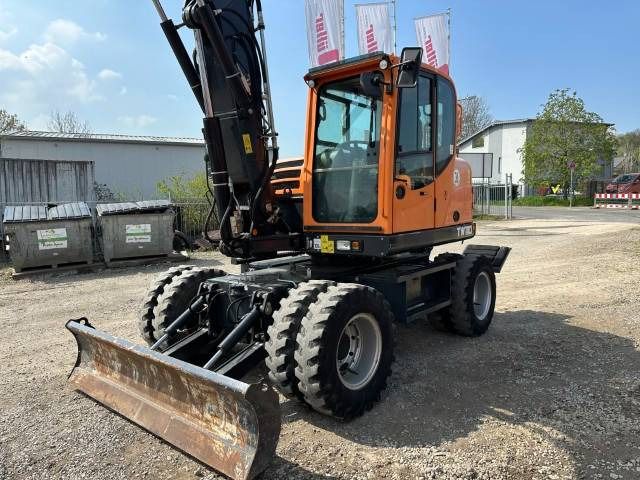 2020 Yanmar TW 110 wheel excavator, front three-quarter view 2020 Yanmar TW 110 wheel excavator, front three-quarter view