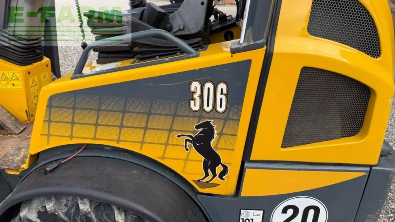 2014 Mustang AL 306 mini excavator side panel detail 2014 Mustang AL 306 mini excavator side panel detail