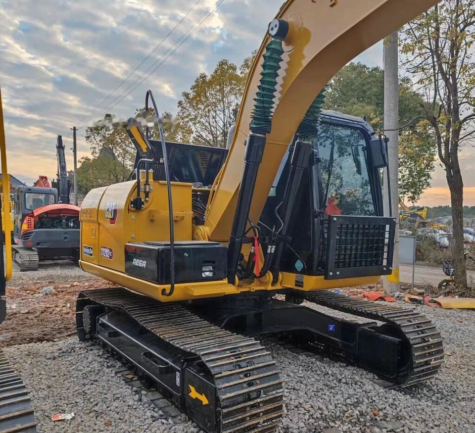 Caterpillar 312D crawler excavator, side view