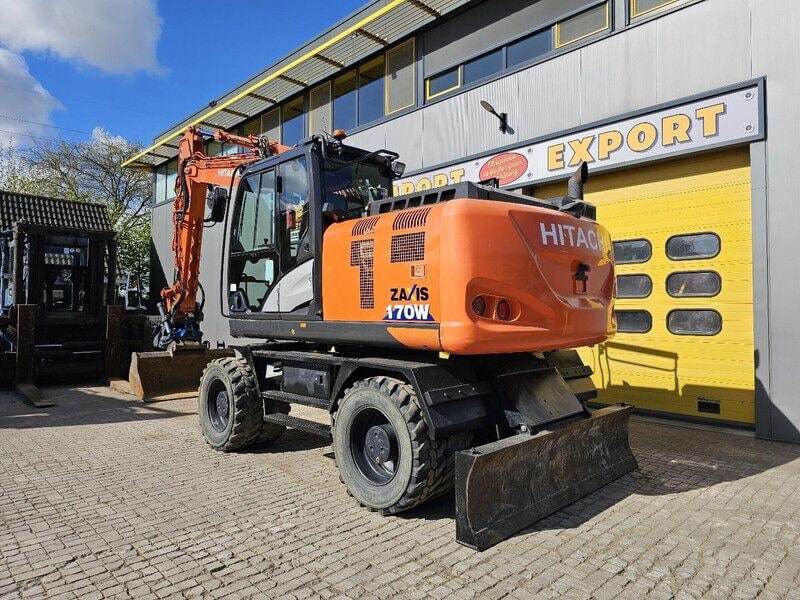 2019 Hitachi Zaxis 170W wheel excavator, rear three-quarter view 2019 Hitachi Zaxis 170W wheel excavator, rear three-quarter view