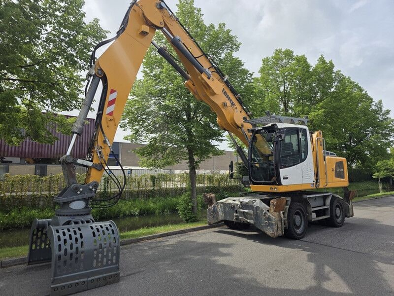 2015 Liebherr LH 24 material handler, side view