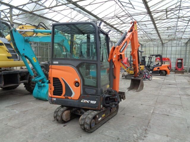 2017 Doosan DX19 mini excavator, rear three-quarter view