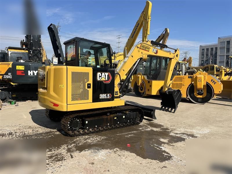 2024 Caterpillar 305.5E2 mini excavator, rear three-quarter view 2024 Caterpillar 305.5E2 mini excavator, rear three-quarter view