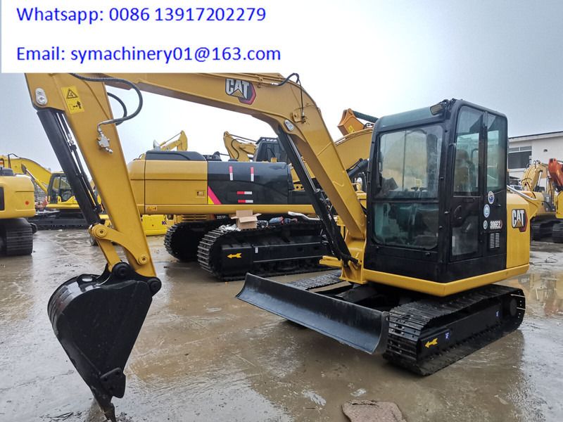 2023 Caterpillar 306E2 mini excavator, front three-quarter view 2023 Caterpillar 306E2 mini excavator, front three-quarter view