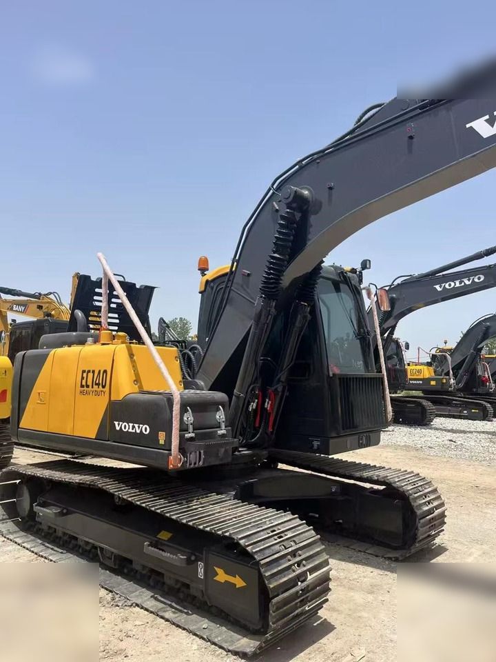 2022 Volvo EC140 crawler excavator, rear three-quarter view 2022 Volvo EC140 crawler excavator, rear three-quarter view