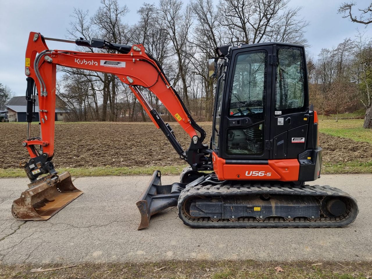 2024 Kubota U56-5 mini excavator, side view