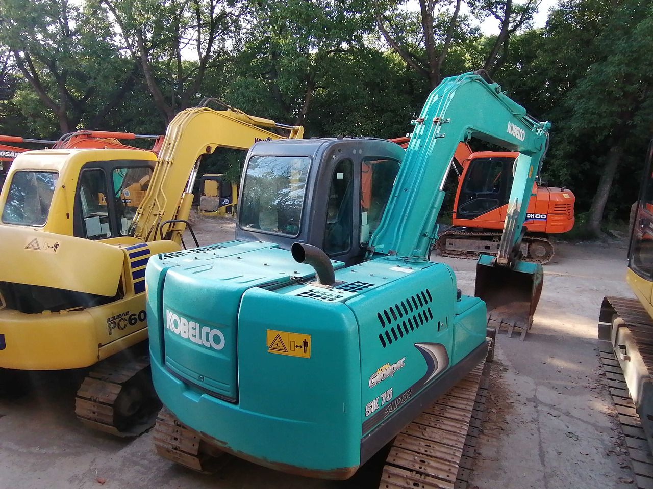 2022 Kobelco SK75-8 excavator, rear three-quarter view