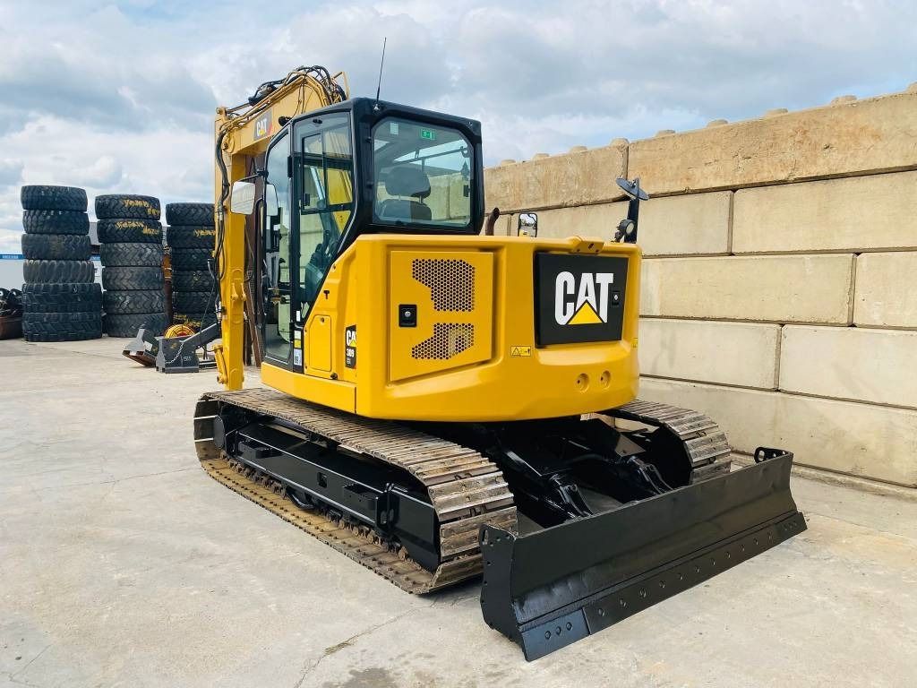 2019 Caterpillar 309 CR mini excavator, rear three-quarter view