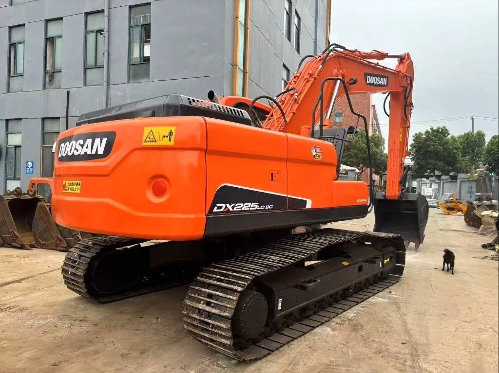 2022 Doosan DX225LC-9C crawler excavator, rear three-quarter view