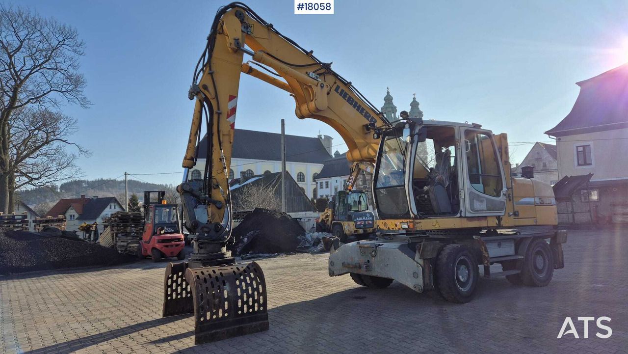 2010 Liebherr A316 LITRONIC material handler, front three-quarter view 2010 Liebherr A316 LITRONIC material handler, front three-quarter view