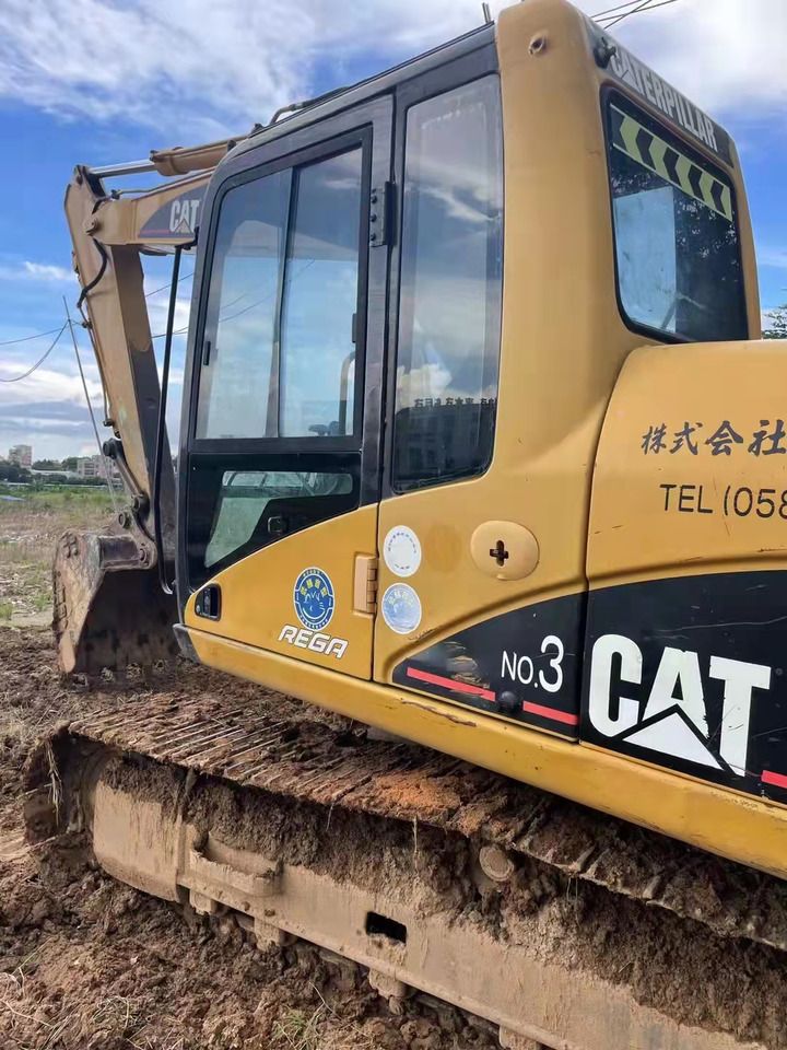 2023 Caterpillar 312C crawler excavator side view 2023 Caterpillar 312C crawler excavator side view