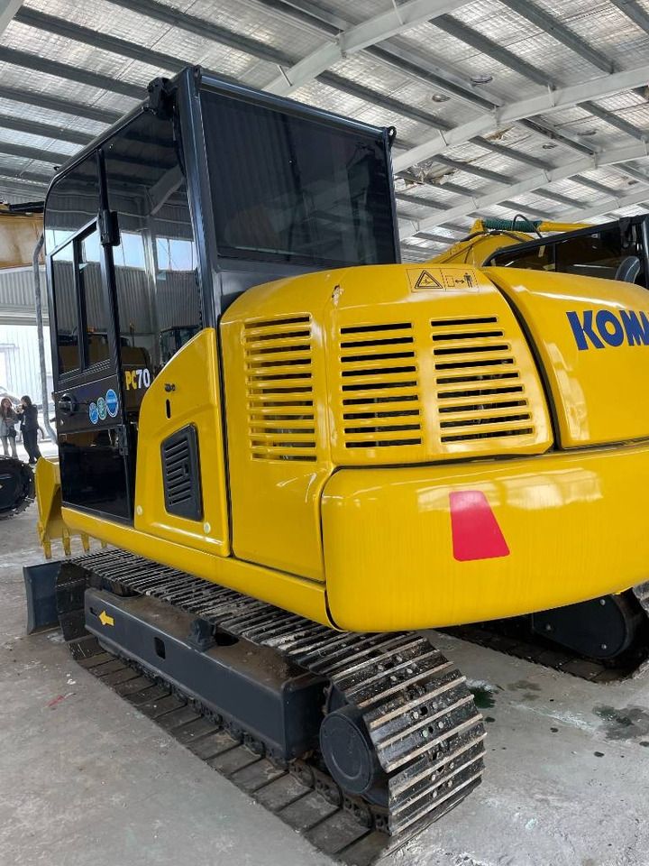 2023 Komatsu PC70 mini excavator, rear three-quarter view 2023 Komatsu PC70 mini excavator, rear three-quarter view