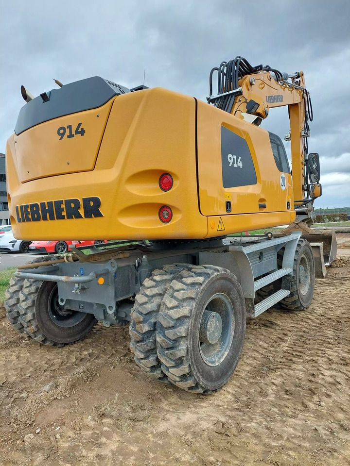 2023 Liebherr 914 Litronic wheel excavator rear three-quarter view 2023 Liebherr 914 Litronic wheel excavator rear three-quarter view