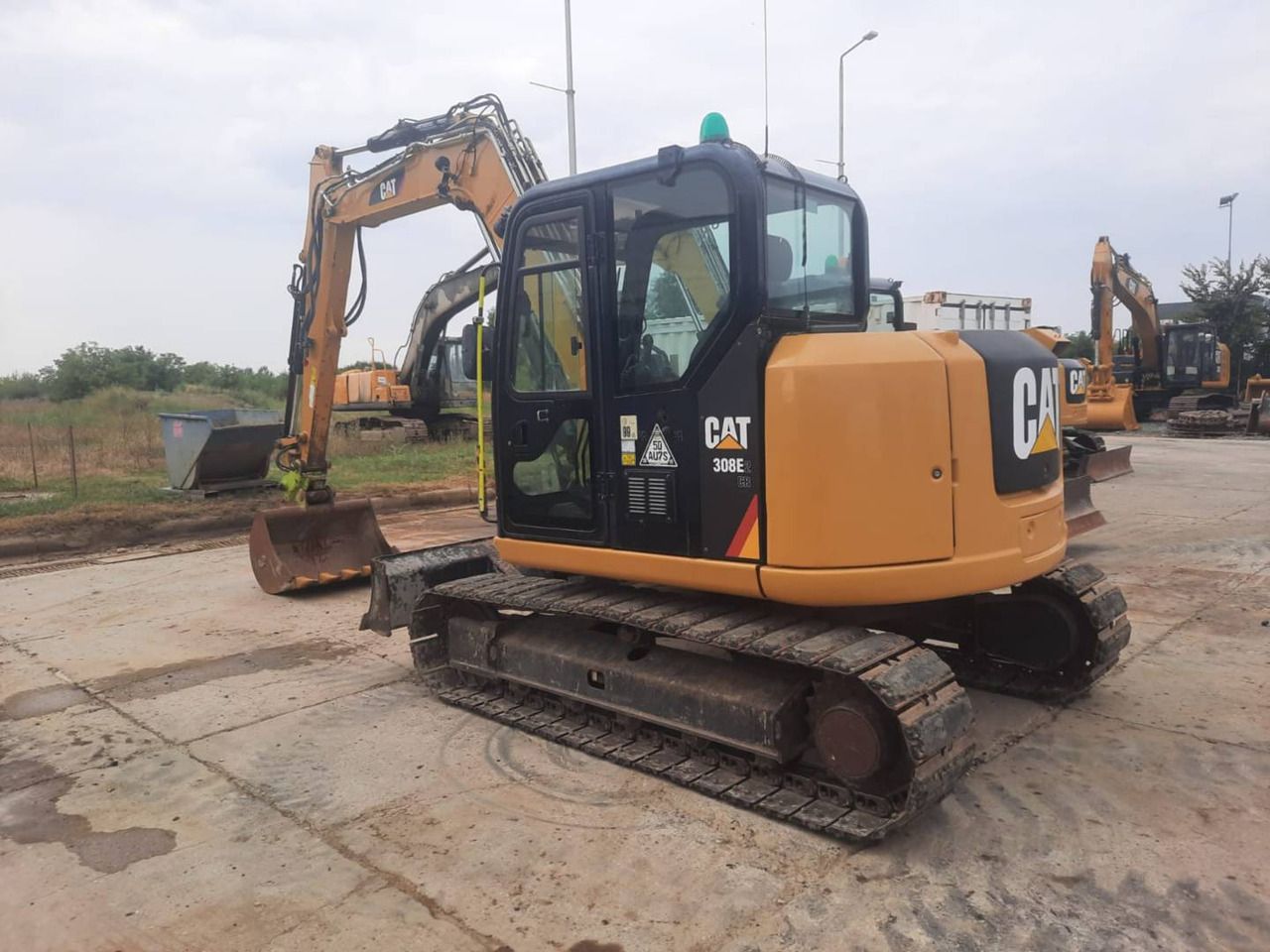 2018 Caterpillar 308E2CR crawler excavator, rear three-quarter view