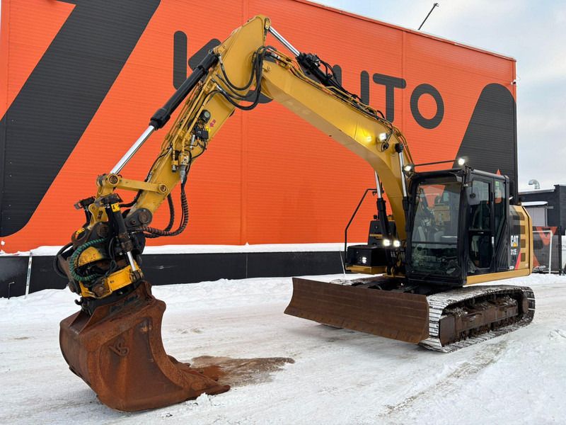 2015 Caterpillar 312 EL crawler excavator side view 2015 Caterpillar 312 EL crawler excavator side view